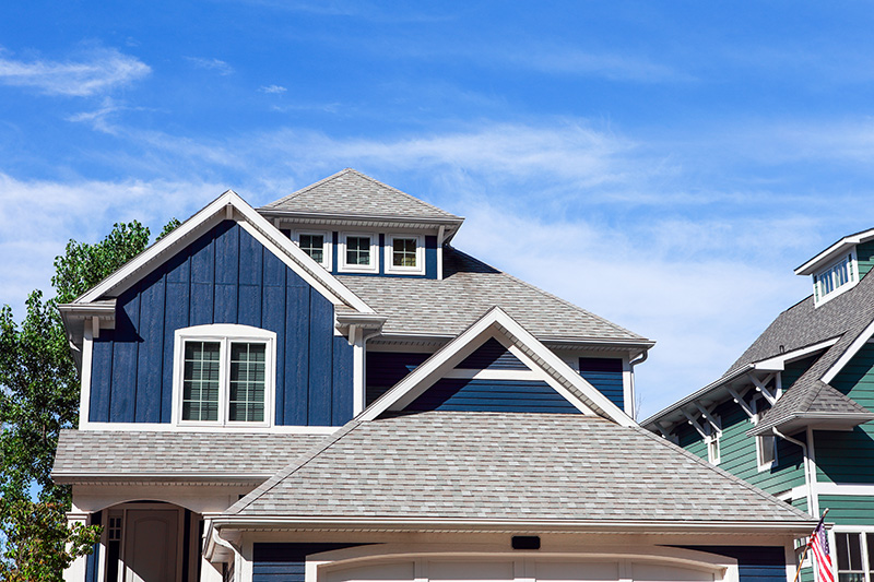 residential house with multi-layered roof structure